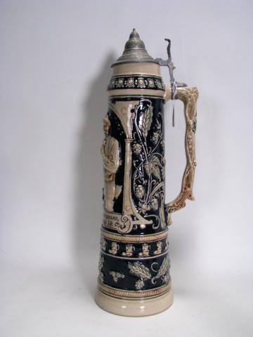 Appraisal: Vintage German lidded stein approximately liter with tavern scene tall