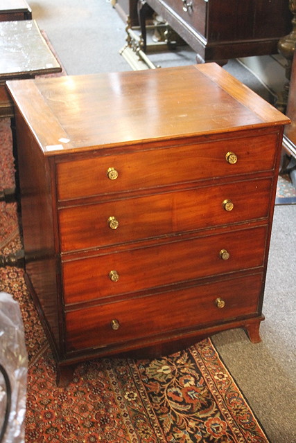 Appraisal: A GEORGE III MAHOGANY CONVERTED COMMODE with hinged top over