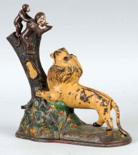 Appraisal: Cast Iron Lion Monkeys Mechanical Bank Description Manufactured by J