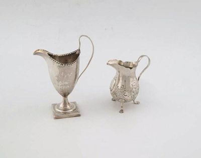 Appraisal: A George III helmet cream jug makers mark of George