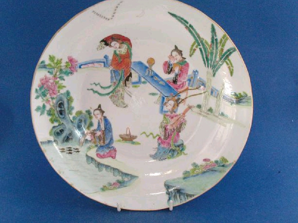 Appraisal: A CHINESE FAMILLE VERTE PLATE enamelled in polychrome with elegant