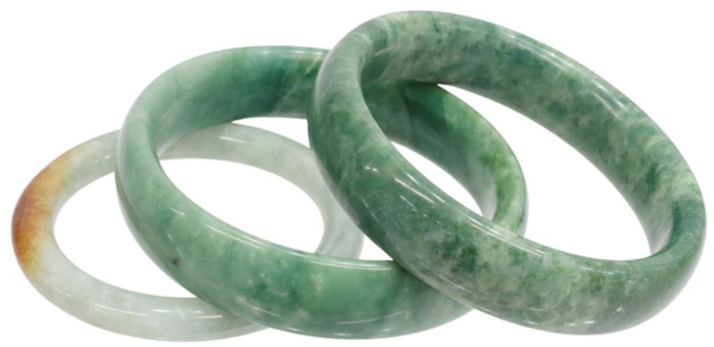 Appraisal: lot of Chinese jade bangle bracelets including celadon and russet