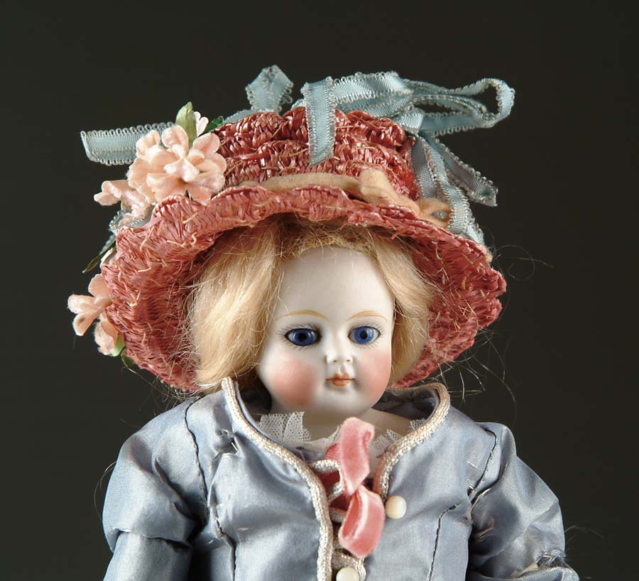 Appraisal: SOLID DOME CLOSE MOUTH BISQUE SHOULDER HEAD DOLL Unmarked doll