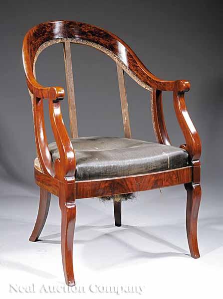 Appraisal: An American Late Classical Carved Mahogany Armchair of Gondola Form