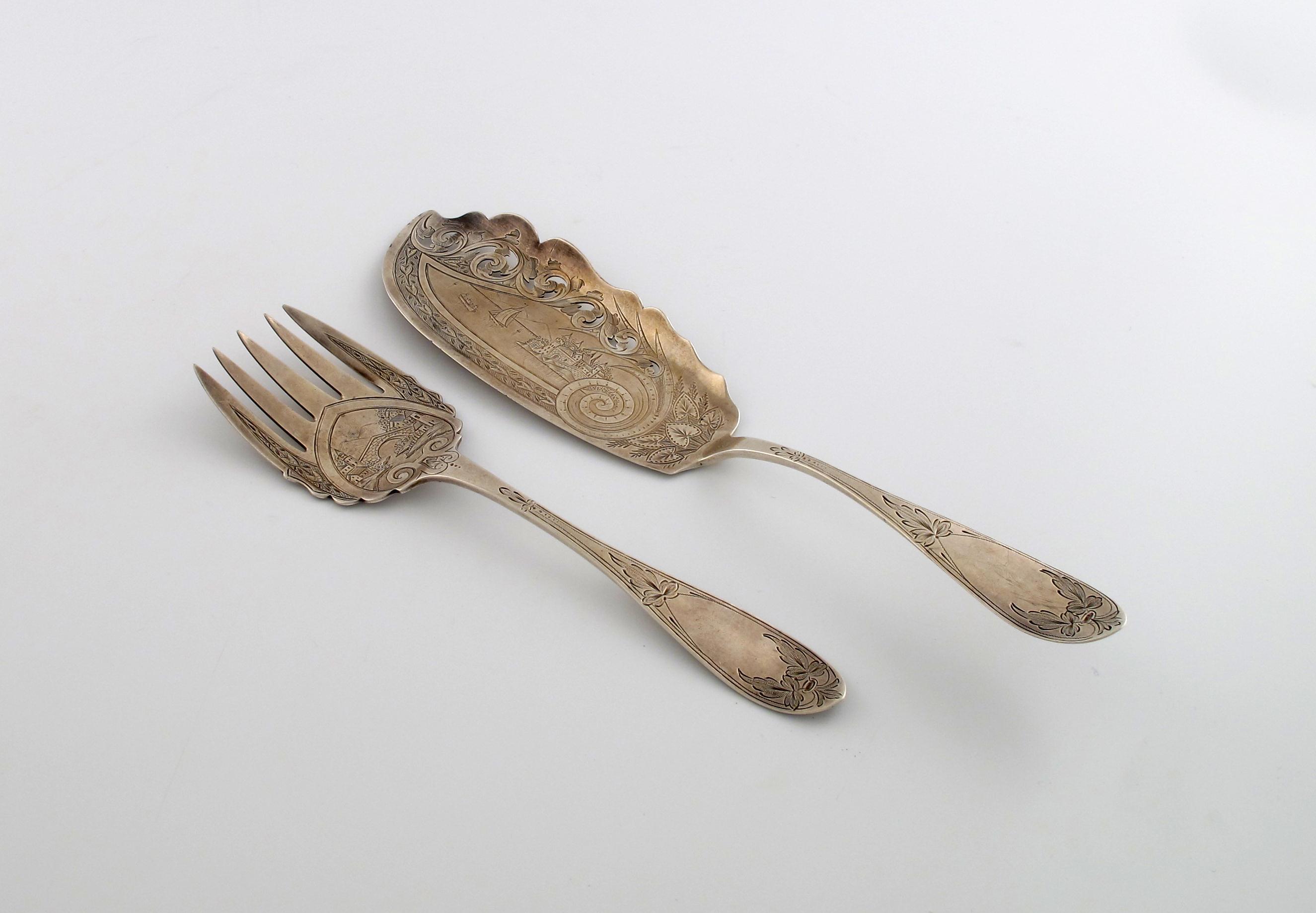 Appraisal: A pair of Victorian provincial silver fish servers