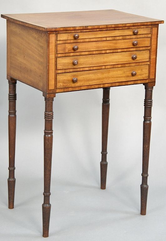 Appraisal: Sheraton mahogany and satinwood work table having four graduated drawers