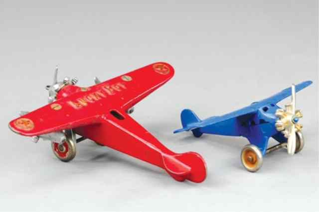 Appraisal: LUCKY BOY AND MONOPLANE Both cast iron includes Dent three