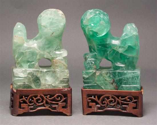 Appraisal: Pair of Chinese carved green quartz foo dogs th century