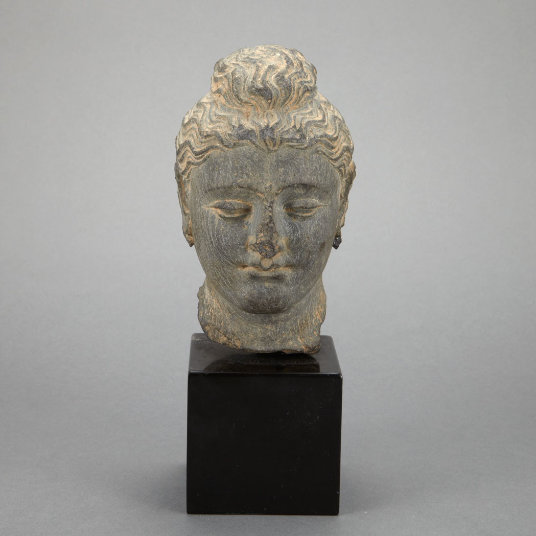 Appraisal: Gandharan Gray Schist Head of Buddha nd rd Century The