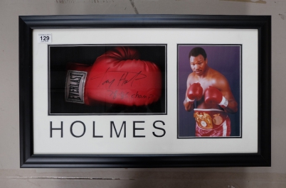 Appraisal: Framed presentation of colour Photograph and signed glove of boxer