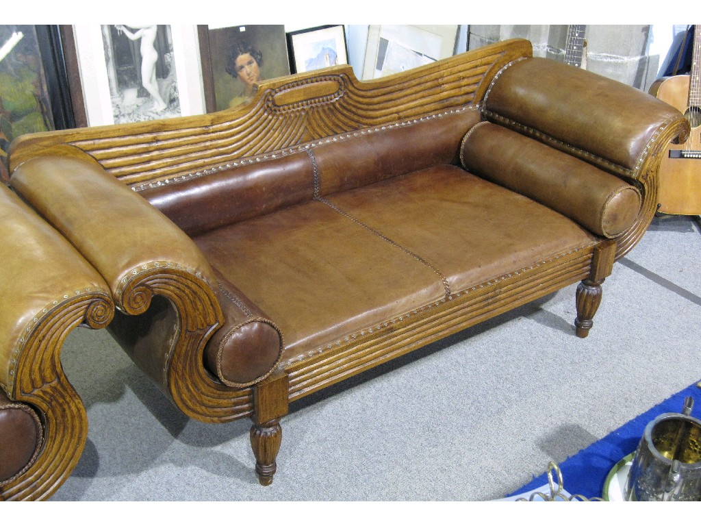 Appraisal: Empire style oak and leather settee