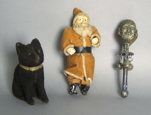 Appraisal: Santa Claus candy container th c together with a cat