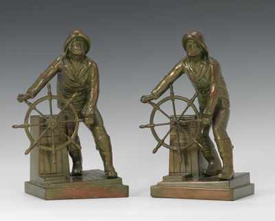 Appraisal: A Pair of Fisherman Bookends Pair of brass bookends of