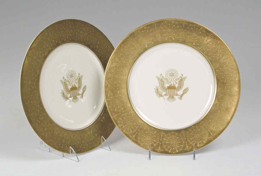 Appraisal: PAIR CASTLETON STUDIOS PRESENTATION SERVICE PLATES Similar in design to