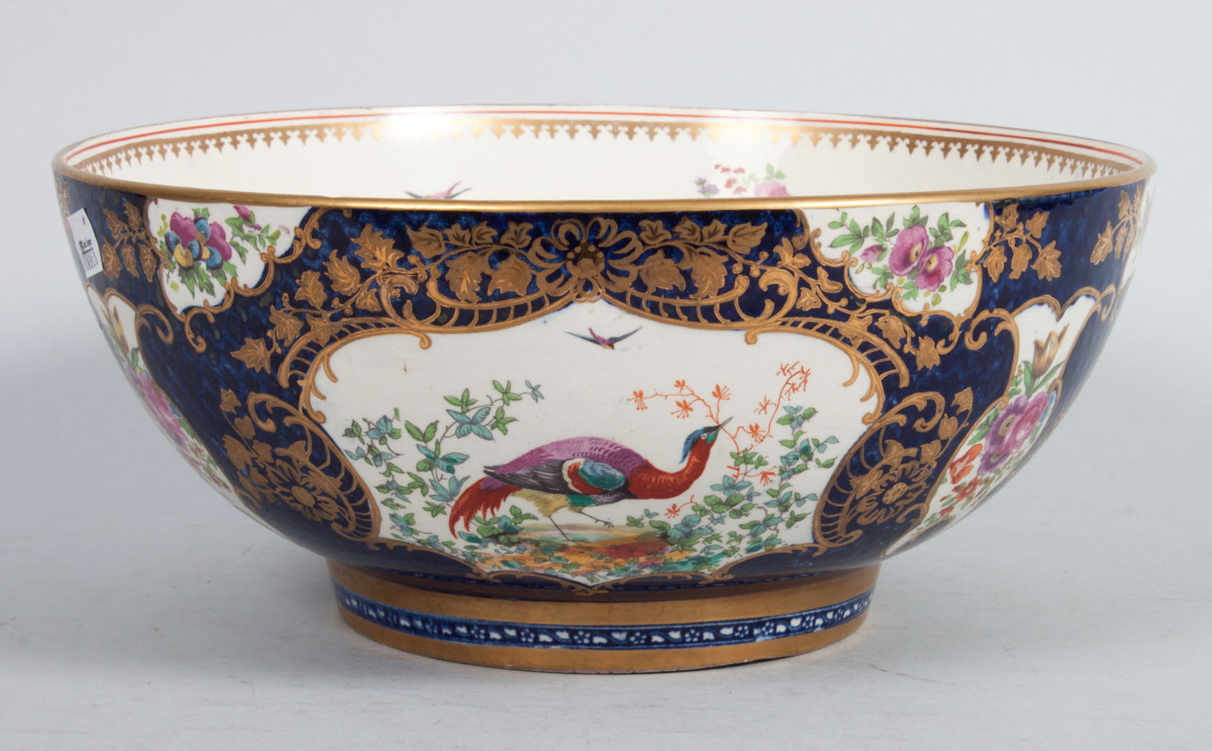 Appraisal: Booth china bowl in the Worcester manner exterior with vignettes