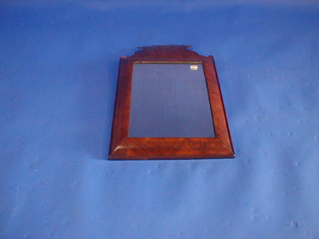 Appraisal: A small th century wall mirror with walnut cushion frame