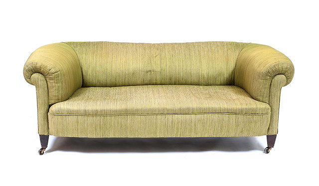 Appraisal: A VICTORIAN CHESTERFIELD SETTEE with rolled ends green upholstery on