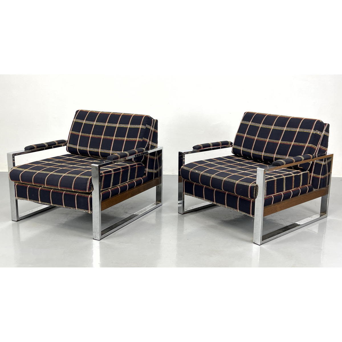 Appraisal: Pr MILO BAUGHMAN style Chrome Frame Lounge Chairs Wood skirt