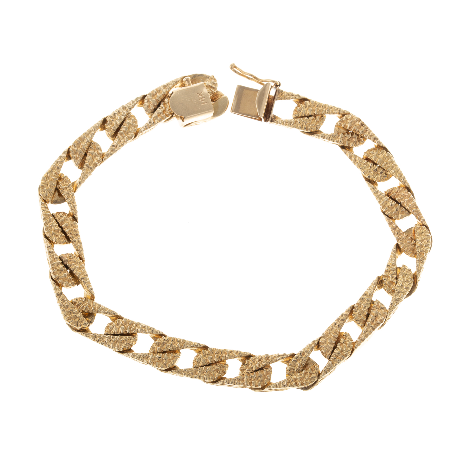 Appraisal: A TEXTURED CURB LINK BRACELET IN K K yellow gold