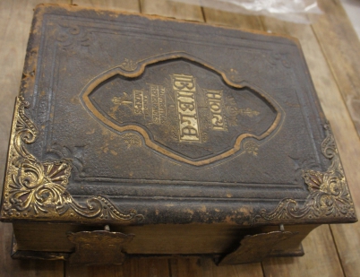 Appraisal: Large th Century Holy Bible with guilded metal edges front