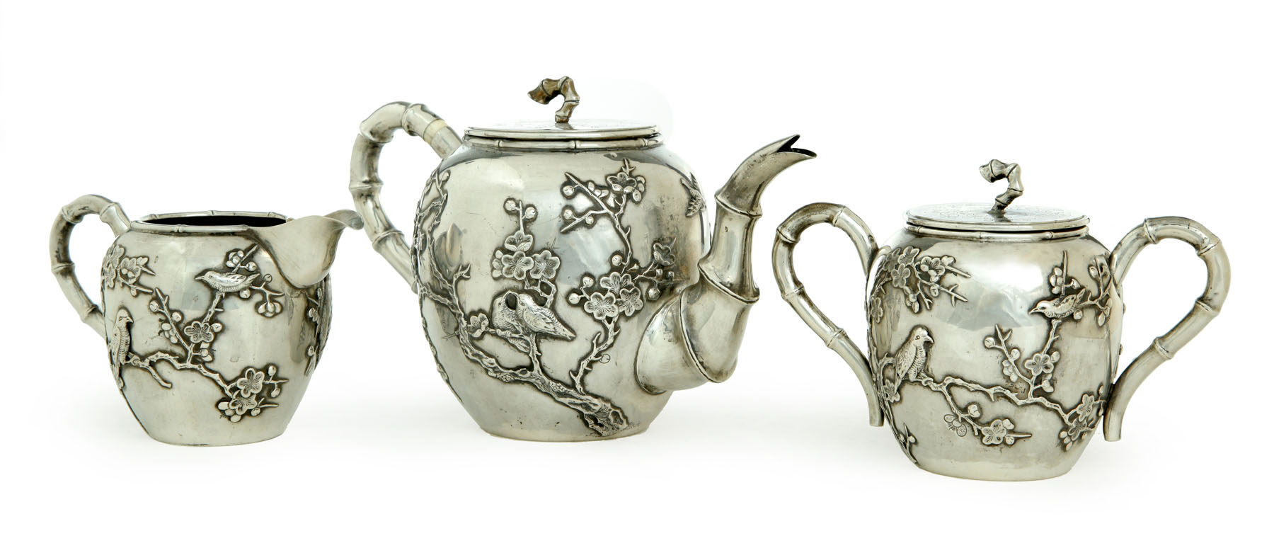 Appraisal: THREE-PIECE SILVER TEA SET China early th century Teapot h