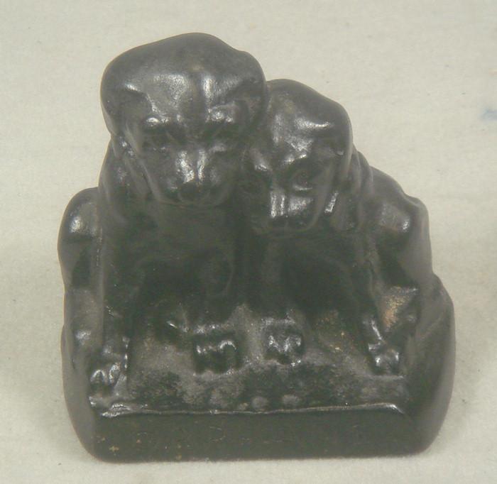 Appraisal: Cast iron doorstop two puppies on base labeled Orphans stamped