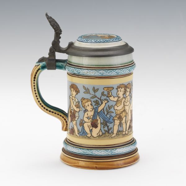 Appraisal: METTLACH STEIN x Mettlach stein depicting Bacchanalian scene around the