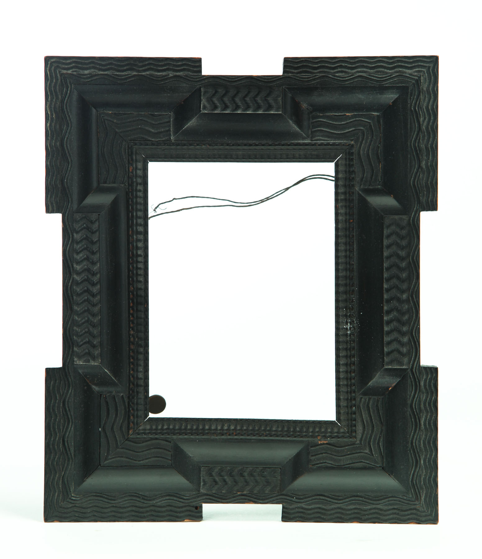 Appraisal: EXPORT FRAME China th century pine Extensively carved frame with