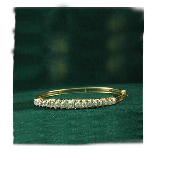 Appraisal: A Diamond Hinged Bangle the front graduated with claw-set Victorian