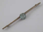 Appraisal: A white metal tests silver aquamarine bar brooch the aquamarine