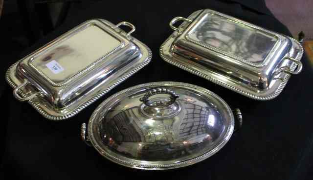 Appraisal: A PAIR OF SILVER PLATED ENTREE DISHES of rectangular form