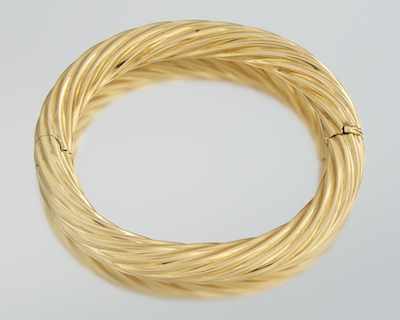 Appraisal: An k Gold Twist Design Bangle Bracelet k yellow gold