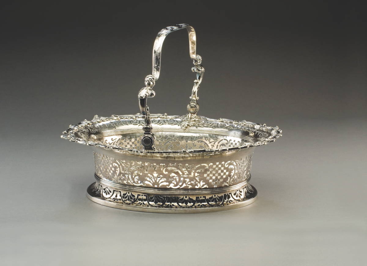 Appraisal: GEORGE II SILVER OVAL CAKE BASKET CHRISTIAN HILLAN LONDON -