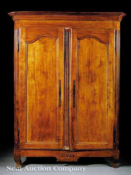 Appraisal: A Provincial Louis XV XVI Inlaid and Carved Cherrywood Armoire