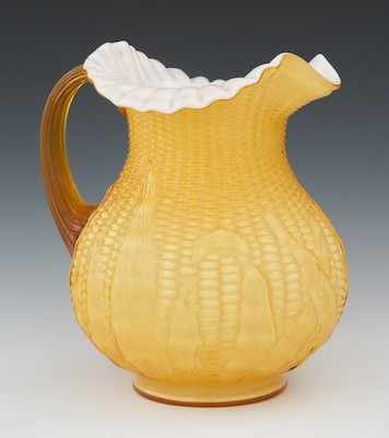 Appraisal: A Cased Glass Water Pitcher The pitcher has a white