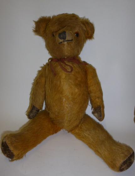 Appraisal: An English early th century teddy bear covered in pale