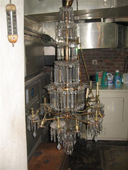 Appraisal: Gilt metal and glass twelve light chandelierlate th century