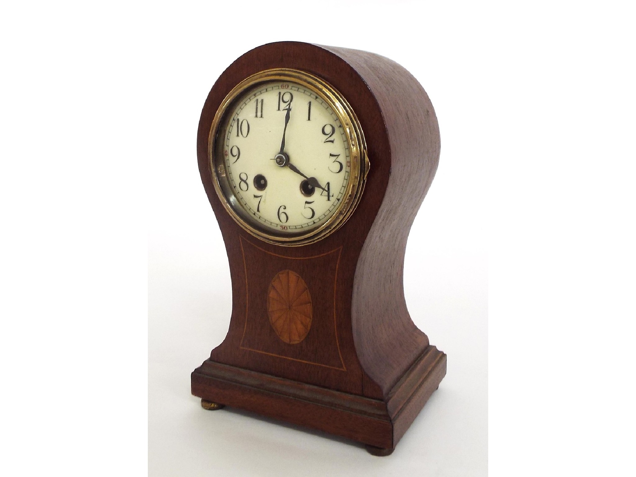 Appraisal: French mahogany inlaid two train mantel clock striking on a