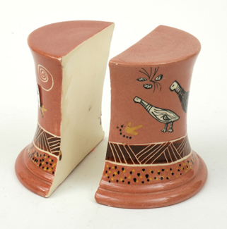 Appraisal: GUY MARTIN BOYD Victoria circa Earthenware socle bookends decorated with