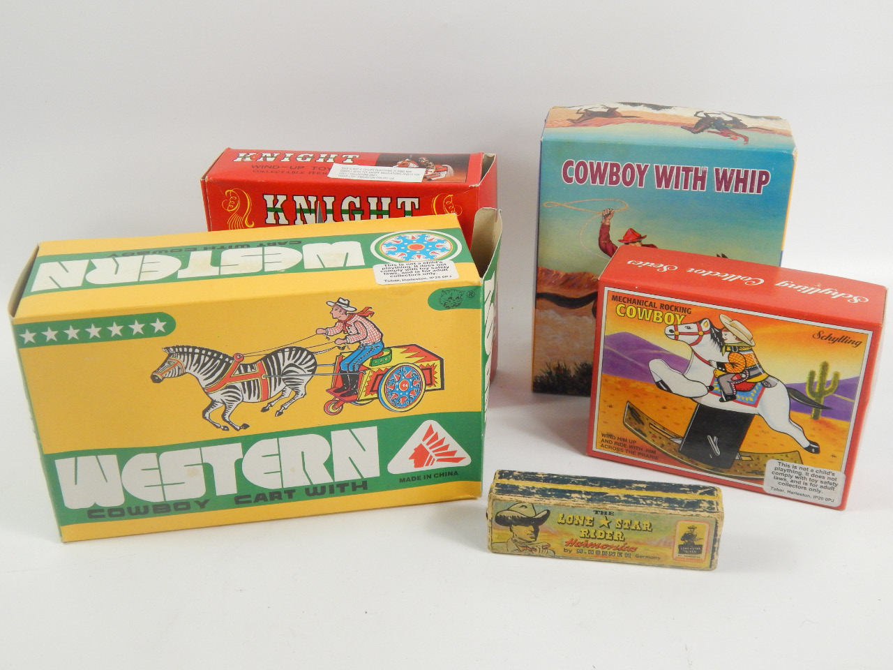 Appraisal: Miscellaneous horse related toys to include a Western cowboy with