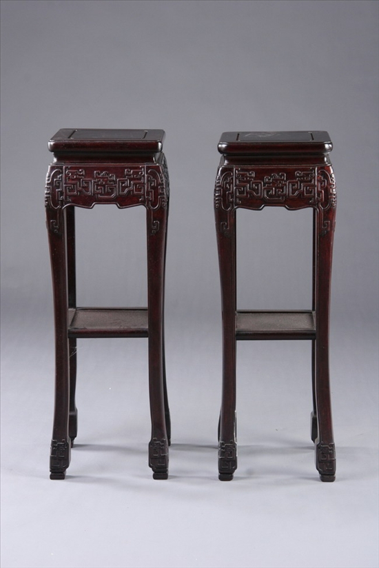 Appraisal: PAIR CHINESE ROSEWOOD STANDS th century Square top above beaded