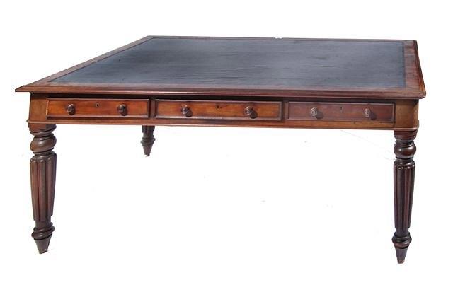 Appraisal: A William IV mahogany writing table with leather inset top