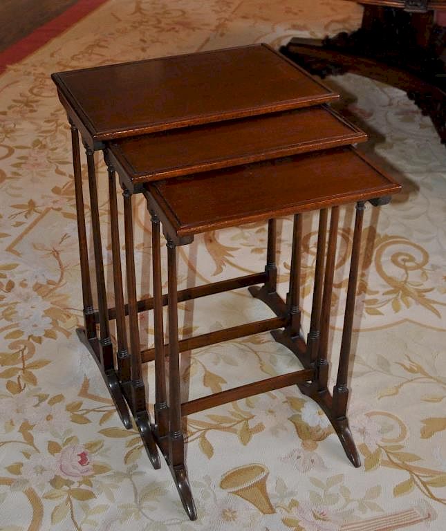 Appraisal: Set Three Regency Style Mahogany Nesting Tables with edge crack