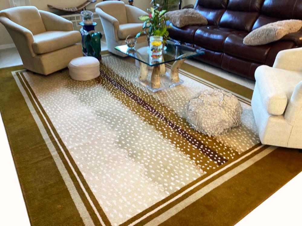 Appraisal: CONTEMPORARY LEOPARD PATTERN CARPETCream with brown spot markings Couristan '