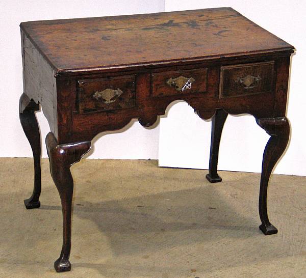 Appraisal: A Queen Anne oak dressing table partially composed of antique