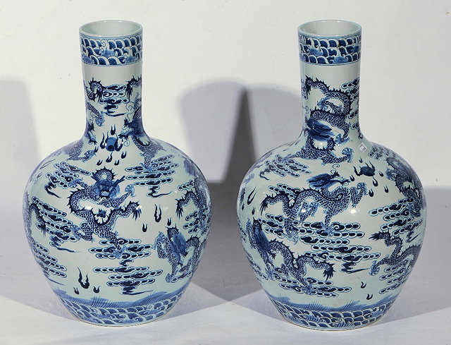 Appraisal: Pair of Chinese blue and white bottle vases th Century