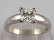 Appraisal: A platinum and diamond solitaire ring the rectangular princess cut