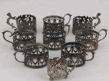 Appraisal: Nine hallmarked silver tea glass holders