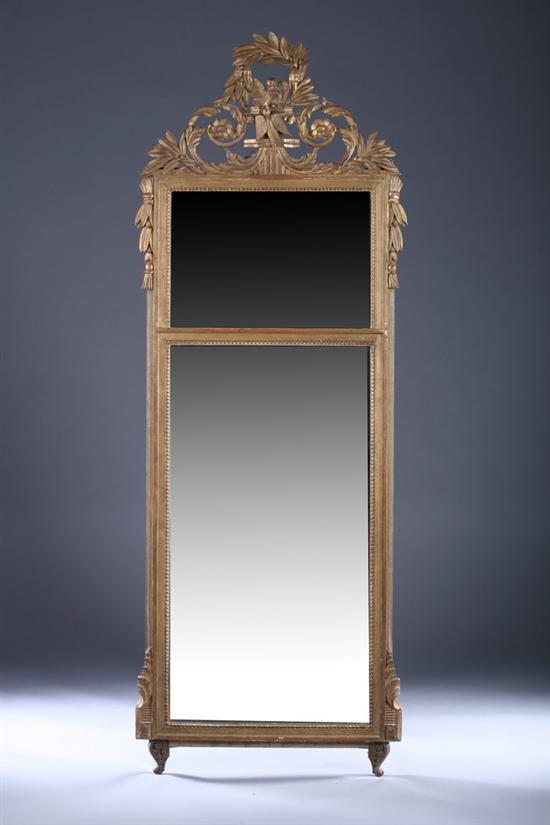 Appraisal: LOUIS XVI STYLE CARVED GILT-WOOD TRUMEAU MIRROR early th century