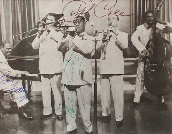 Appraisal: ARMSTRONG LOUIS Photograph Signed Louis Armstrong also Signed by drummer